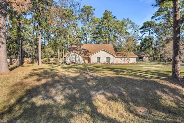 exterior space featuring a front lawn