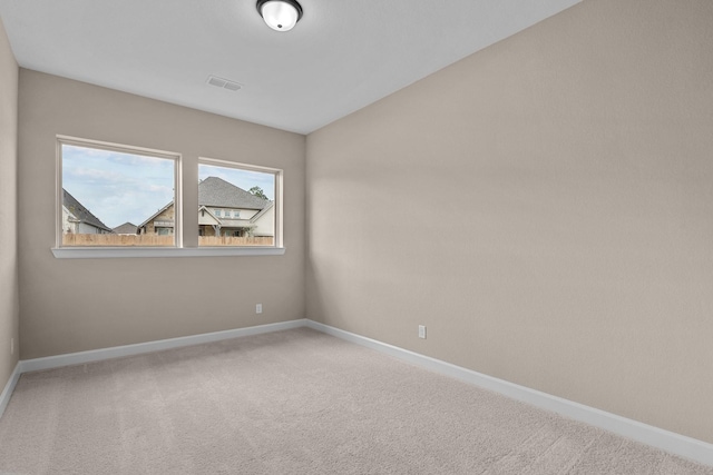 unfurnished room with carpet