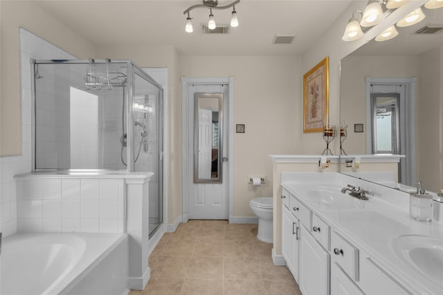 full bathroom featuring tile patterned floors, toilet, vanity, and shower with separate bathtub