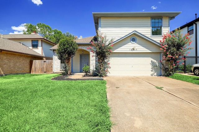 front facade featuring a front yard and a garage