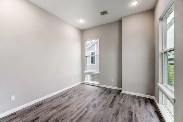 empty room featuring hardwood / wood-style floors