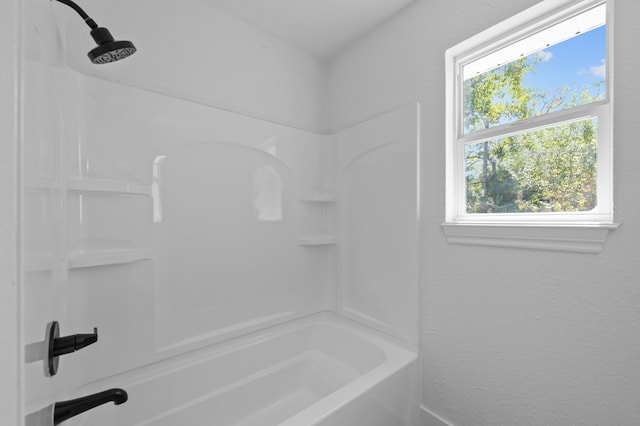 bathroom with shower / washtub combination