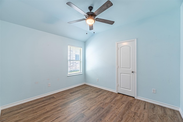 unfurnished room featuring wood-type flooring, vaulted ceiling, and ceiling fan