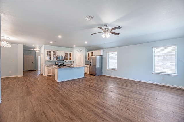 kitchen with white cabinetry, plenty of natural light, and appliances with stainless steel finishes