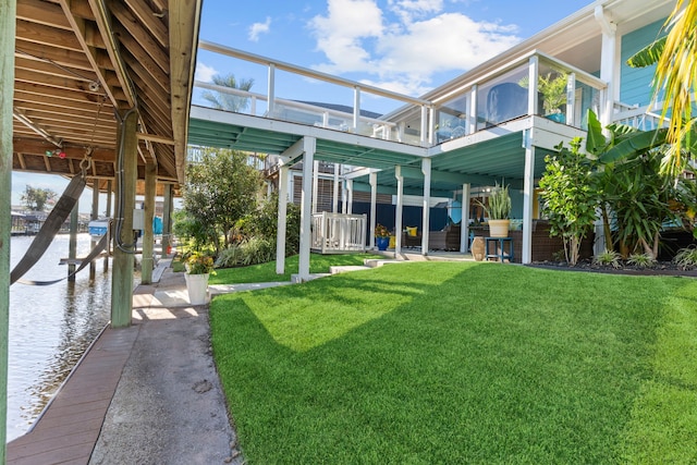 exterior space featuring a water view and a boat dock