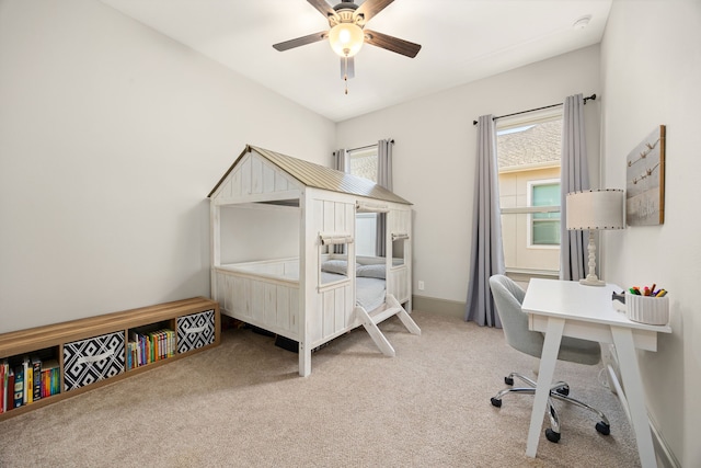 carpeted bedroom featuring ceiling fan