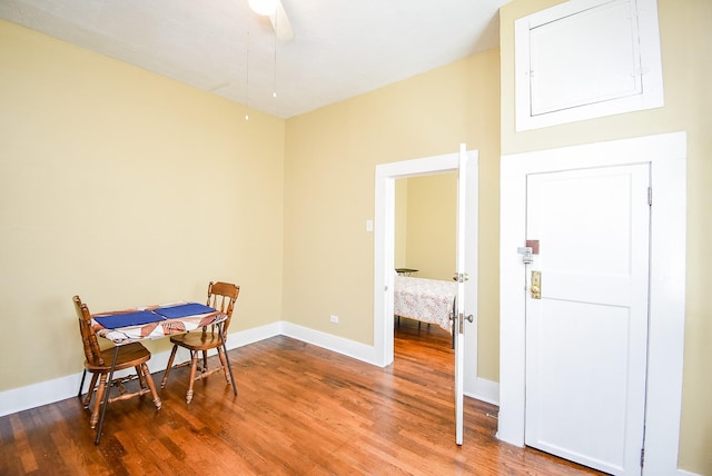 interior space with hardwood / wood-style floors and ceiling fan