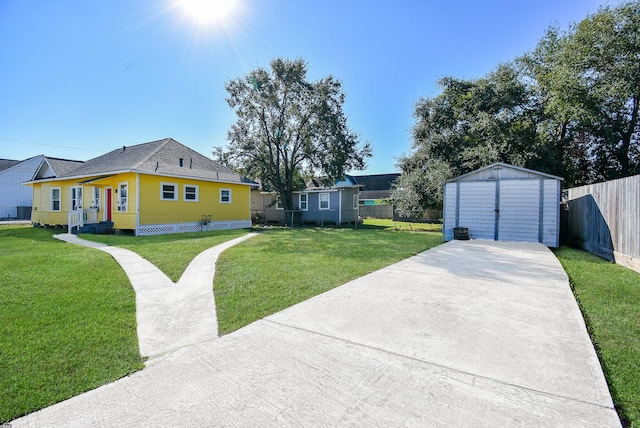 view of front facade with a shed and a front yard