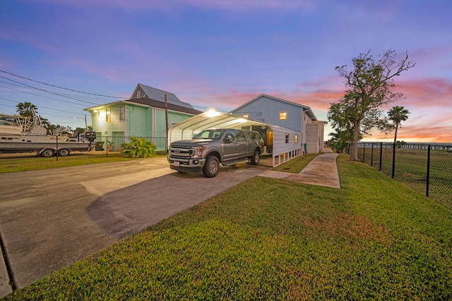 view of front of house with a yard