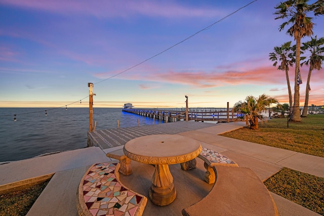 dock area with a water view