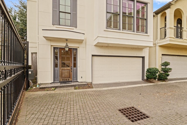 view of front of home with a garage