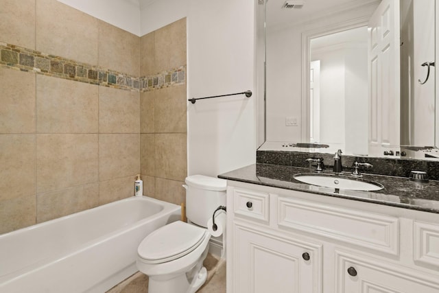 full bathroom with tiled shower / bath combo, toilet, ornamental molding, and vanity