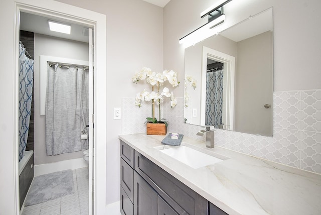 7618 Highmeadow Dr, Houston, TX 77063 - full bathroom with vanity, tasteful backsplash, shower / bath combination with curtain, and tile patterned flooring