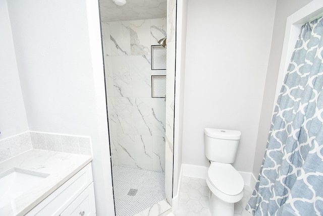 7618 Highmeadow Dr, Houston, TX 77063 - full bathroom with a marble finish shower, vanity, and tile patterned flooring