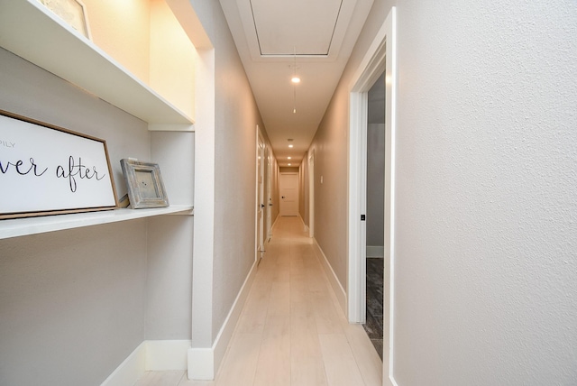 7618 Highmeadow Dr, Houston, TX 77063 - corridor with attic access and light wood-type flooring
