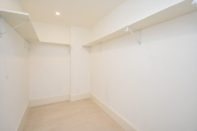 7618 Highmeadow Dr, Houston, TX 77063 - spacious closet featuring light wood finished floors