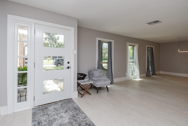 entryway with light wood-type flooring