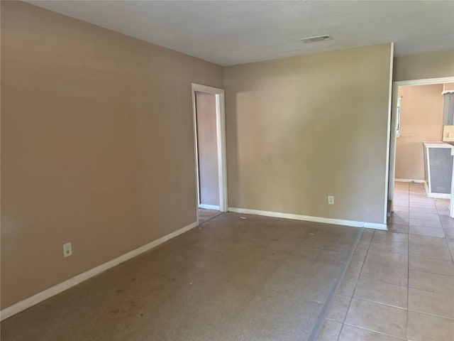 view of tiled spare room