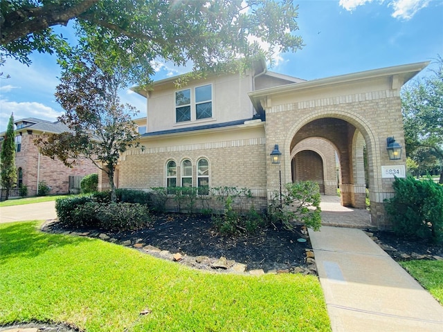 view of front of house with a front lawn