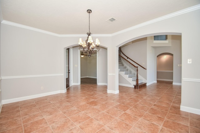 tiled empty room with crown molding and a chandelier