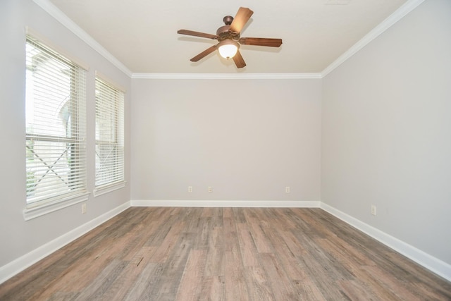 spare room featuring crown molding, hardwood / wood-style floors, and ceiling fan