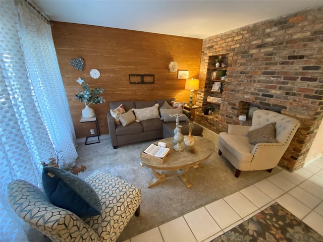 living room featuring tile patterned flooring and wooden walls