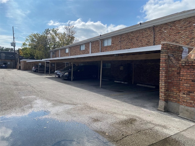 view of car parking with a carport