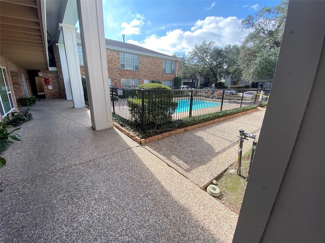 view of pool with a patio