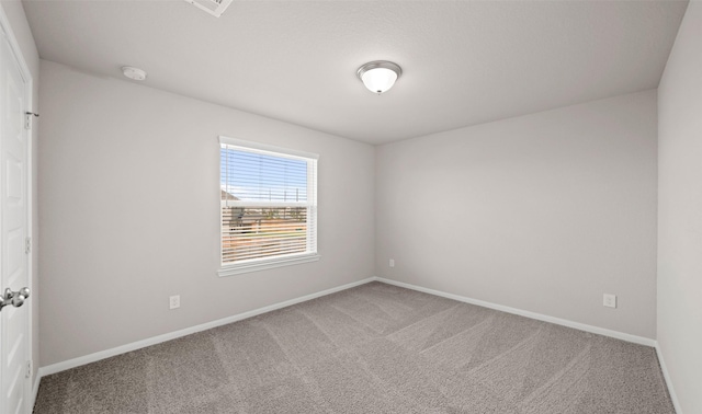 unfurnished room featuring carpet floors