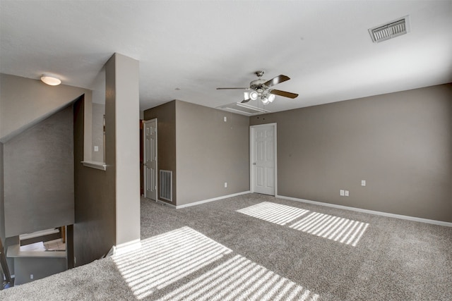 interior space featuring carpet flooring and ceiling fan