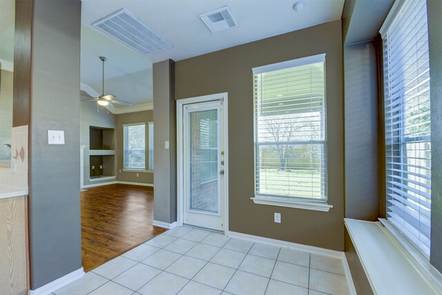 interior space featuring light hardwood / wood-style floors and ceiling fan