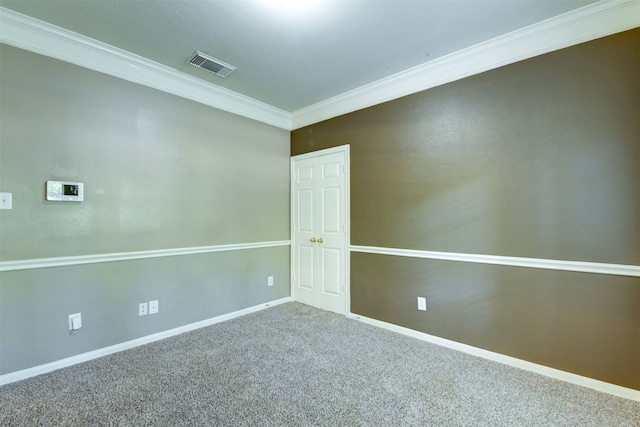 carpeted empty room with ornamental molding