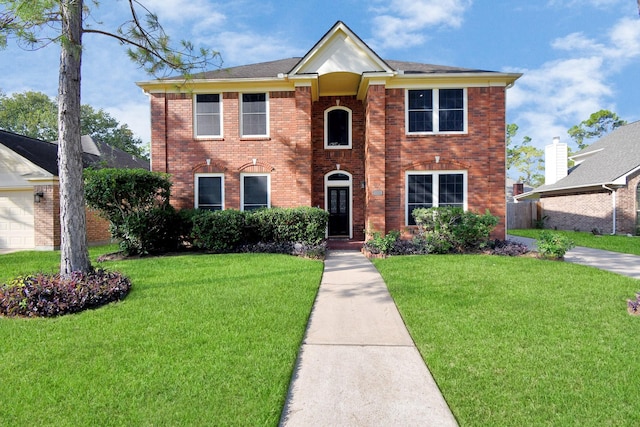 view of front facade featuring a front yard