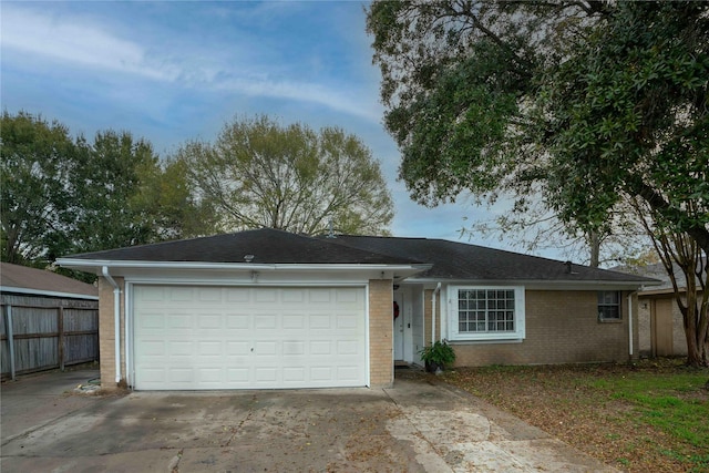 ranch-style home with a garage