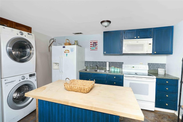 washroom featuring sink and stacked washer / dryer