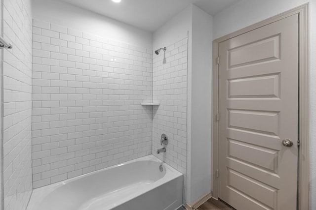 6605 Alexis St, Beaumont, TX 77708 - full bath featuring shower / bath combination and wood finished floors