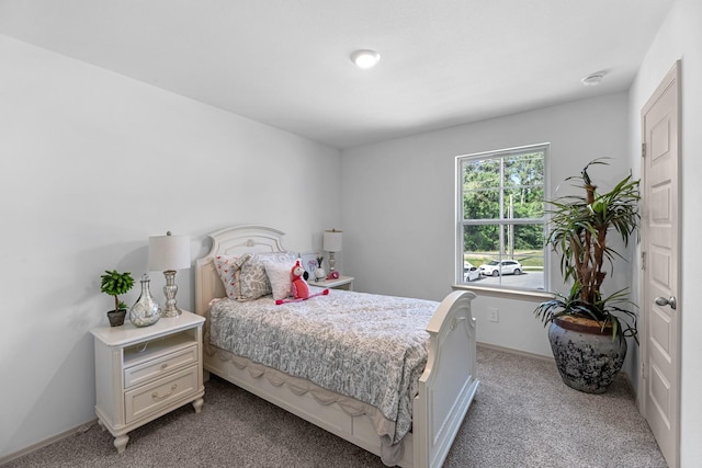 6605 Alexis St, Beaumont, TX 77708 - bedroom with baseboards and carpet