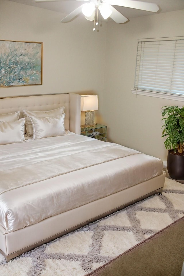 bedroom with carpet floors and ceiling fan