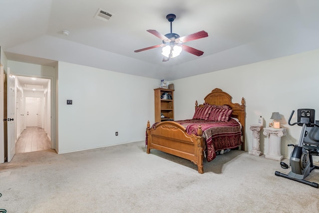 carpeted bedroom featuring ceiling fan and lofted ceiling