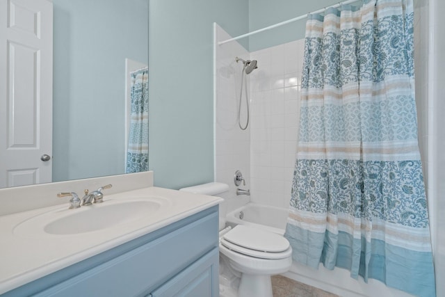 full bathroom with shower / tub combo, vanity, toilet, and tile patterned floors