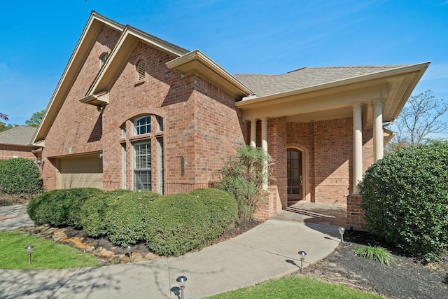 view of front of property with a garage