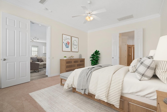 bedroom featuring ceiling fan, crown molding, light carpet, and connected bathroom