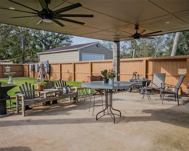 view of patio featuring ceiling fan