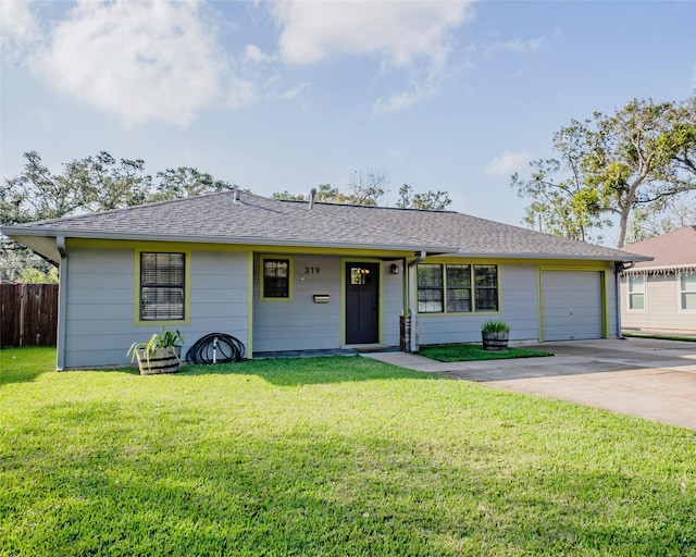 single story home with a garage and a front yard