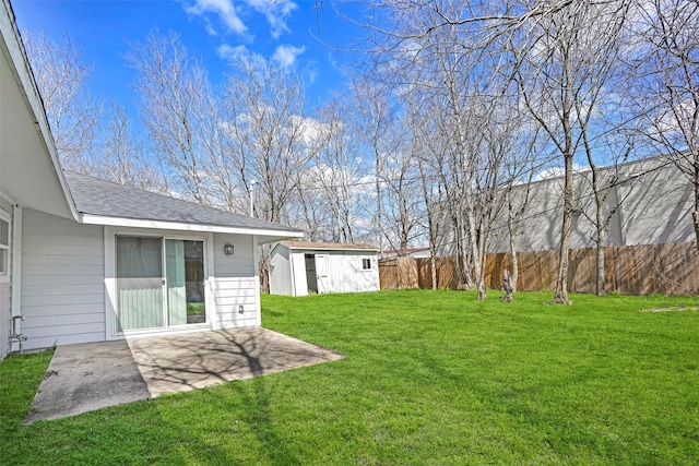 view of yard with a patio and an outdoor structure