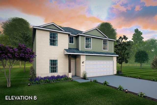 view of front of house with a lawn and a garage