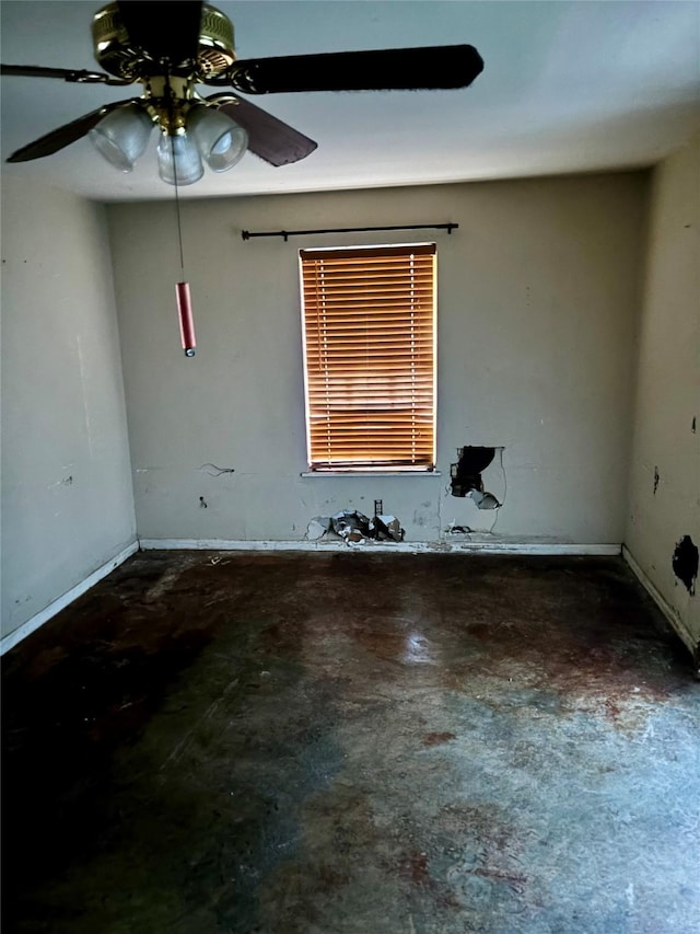 unfurnished room with ceiling fan