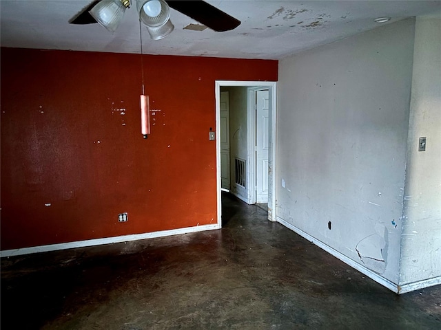 empty room featuring ceiling fan