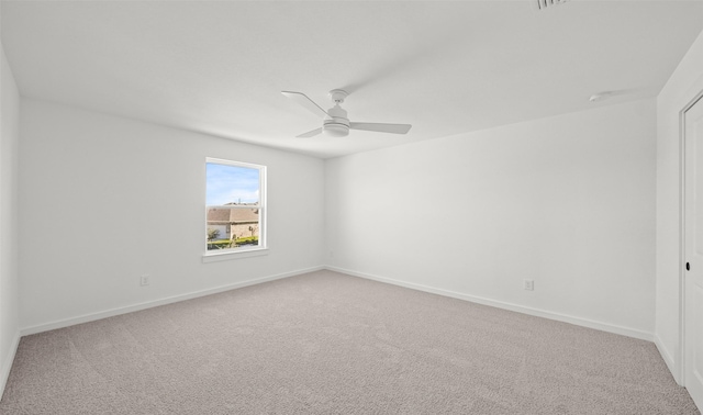 carpeted empty room with ceiling fan