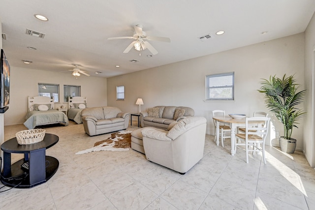 living room with ceiling fan